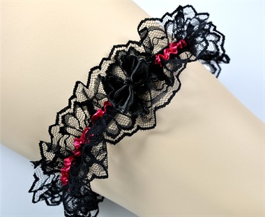 Kousenband met strikje roze